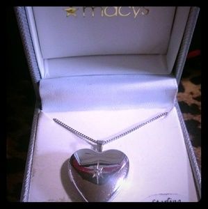 Sterling Silver locket with diamond accent